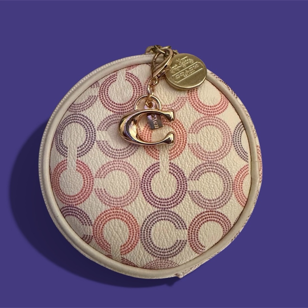 AUTHENTIC Coach Circular Coin Pouch. A mini charm added.